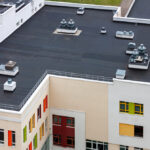 Top,View,Dark,Flat,Roof,With,Air,Conditioners,And,Hydro