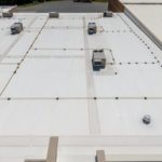 Mid,Day,Drone,Images,Of,Commercial,Roofs,Featuring,Tpo,And