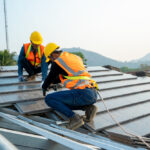 Roofer,Builder,Worker,Installing,Ceramic,Roof,On,Top,Of,The