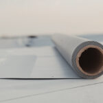 Roofing,Pvc,Membrane,In,Rolls,Placed,On,The,Roof,Of