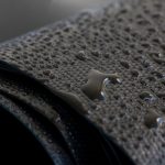 Water,Droplets,On,The,Rubber,Membrane.,Waterproofing...,Close-up,Selective,Focus